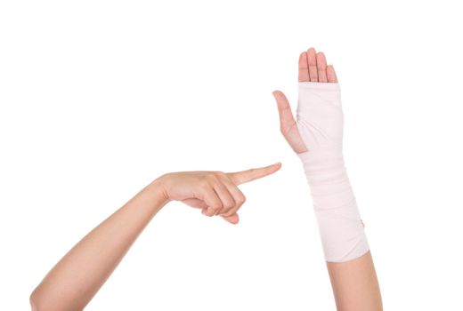 close-up injured arm wrapped in an Elastic Bandage isolated on white background