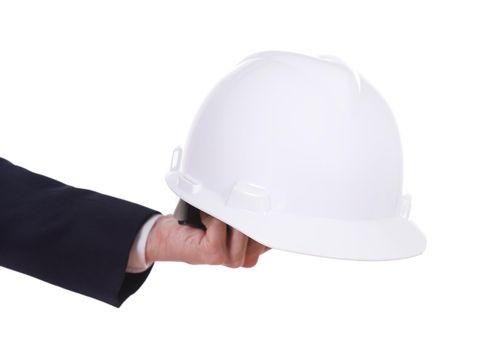hand of engineer holding helmet isolated on white background 