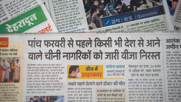 Dehradun, Uttarakhand India June 28, 2021. Hindi, Coronavirus COVID-19 News Headline in Newspaper of India. Headlines of the month March, April 2020.