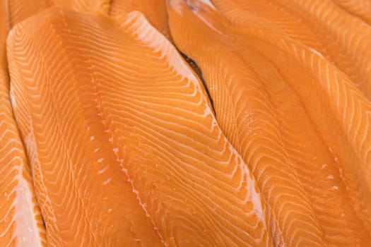 red fish fillet close-up as a background. High quality photo