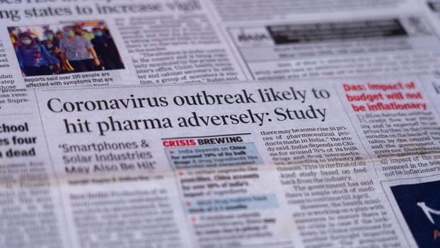 Dehradun, Uttarakhand India June 28, 2021. Coronavirus COVID-19 News Headline in Newspaper of India. Headlines of the month March, April 2020. High-quality apple prores 422 4k footage 60p.