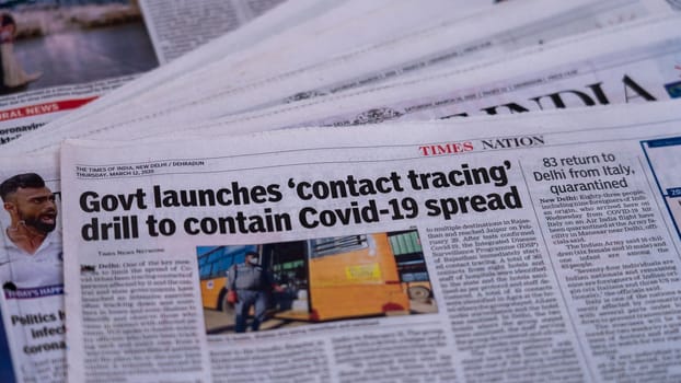 Dehradun, Uttarakhand India June 28, 2021. Coronavirus COVID-19 News Headline in Newspaper of India. Headlines of the month March, April 2020. High-quality apple prores 422 4k footage 60p.