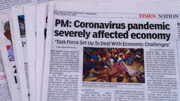 Dehradun, Uttarakhand India June 28, 2021. Coronavirus COVID-19 News Headline in Newspaper of India. Headlines of the month March, April 2020. High-quality apple prores 422 4k footage 60p.