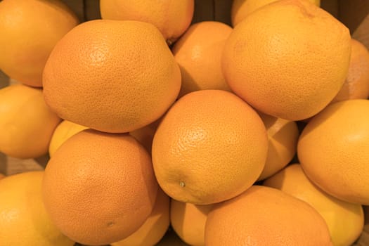 ripe delicious oranges close up as a background. High quality photo