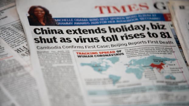 Dehradun, Uttarakhand India June 28, 2021. Coronavirus COVID-19 News Headline in Newspaper of India. Headlines of the month March, April 2020. High-quality apple prores 422 4k footage 60p.