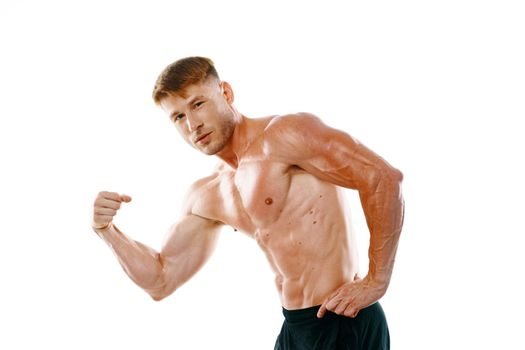 man with a pumped up body muscle closeup workout bodybuilders. High quality photo