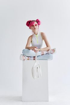 glamorous fashionable woman with pink hair posing hipster neon. High quality photo