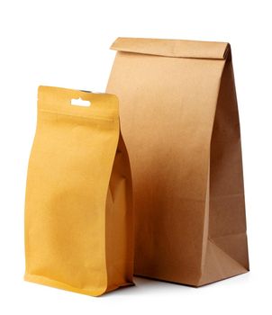Brown craft paper bag packaging template on white background close up