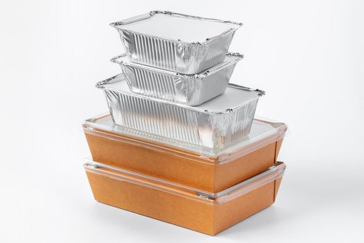 Assortment of food delivery containers on white background close up