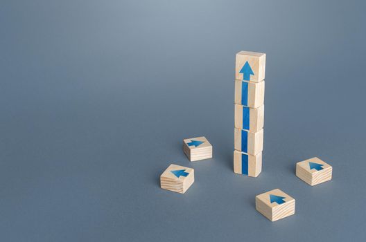 Block tower with arrows. Growth, development progress concept. Achieve success. Career promotion. Step by step. improving skills. Goal achievement. Progress and movement forward. Self improvement