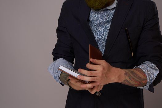 portrait of a business man wearing glasses with a beard posing an official. High quality photo