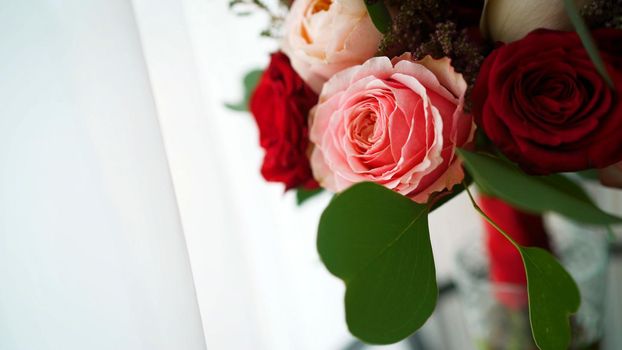 wedding bouquet at bride's hands. Beautiful bridal bouquet