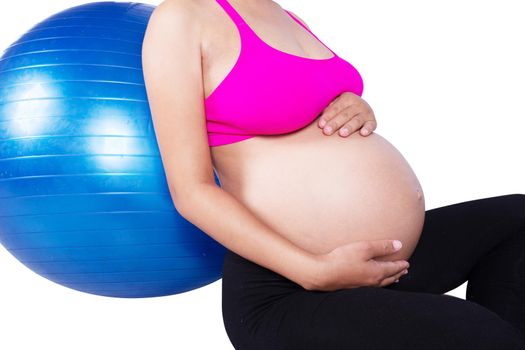 close-up belly of Pregnant woman with fitness ball isolated on white background