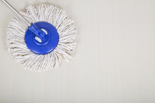 mop for cleaning with the floor background