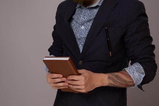 portrait of a business man wearing glasses with a beard posing an official. High quality photo