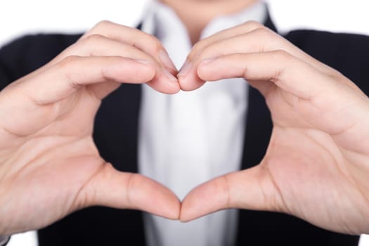 Business woman making a heart shape with her hands