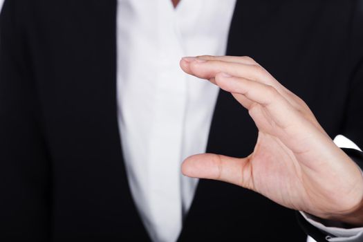 hand of business woman holding something