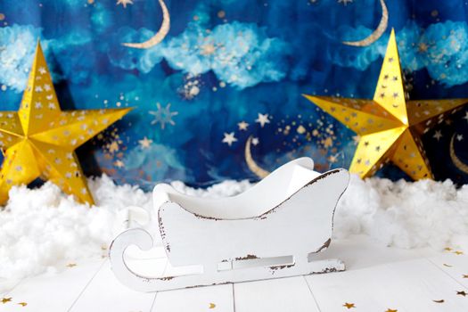 Christmas background with moon and stars. Defocused, bokeh, abstract backdrop