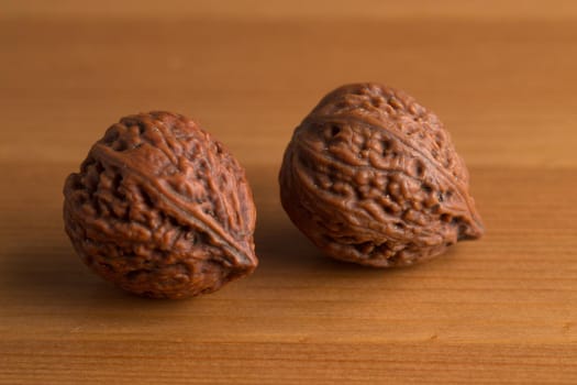 closeup shot Walnuts on wooden table