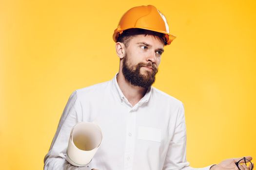 man in orange helmet construction engineer working professional. High quality photo