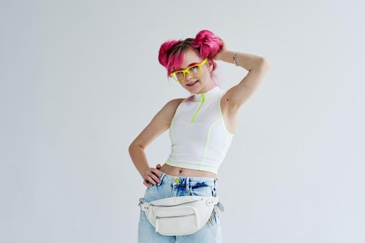 fashionable woman pink hair posing fashion clothes studio model. High quality photo