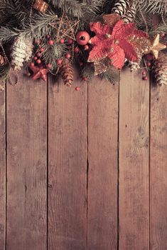 Christmas border design on the wooden background