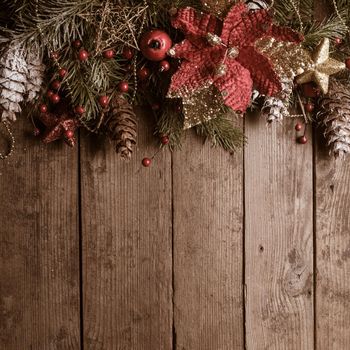 Christmas border design on the wooden background