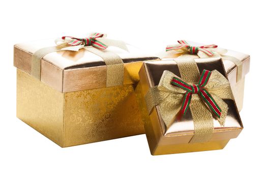 Three golden boxes with bows isolated on white