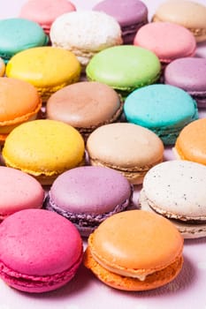 Colorful macaroons - french dessert as a background