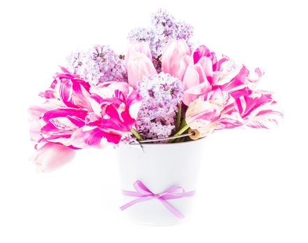 Bouquet from pink tulips and lilac on white