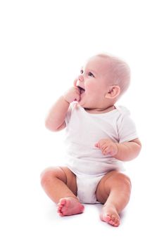 Adorable baby with finger in the mouth