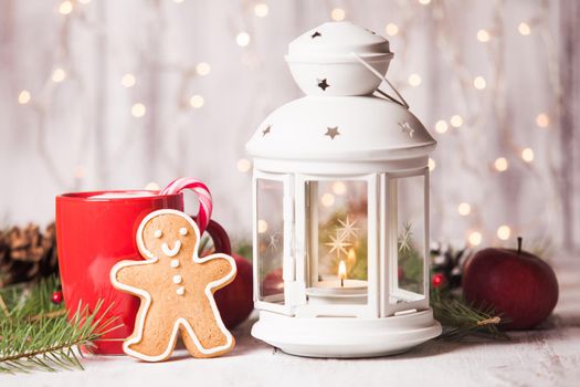 Cup of hot cocoa drink with cookie and candy. Christmas dessert