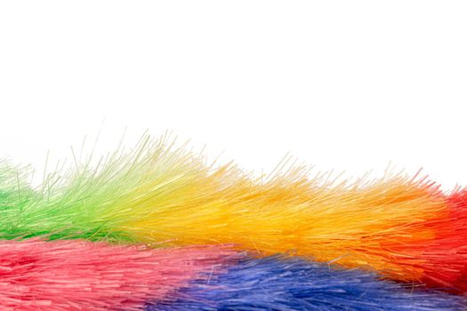 Colorful dust brush isolated on white background, close up