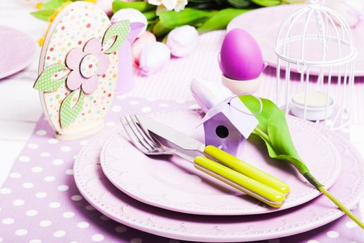 Easter serving, lilac plates and green flatware and decor