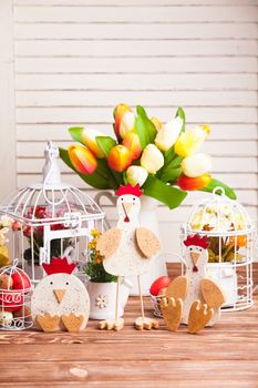 Wooden chickens figures - Easter decorations on the table