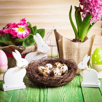 Easter decorations - white shabby chic bunnies and spring flowers