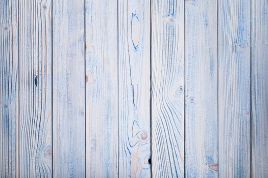 Blue wooden wall, painted in shabby chic style