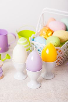 Easter decorations - egg candles, basket and birdhouse