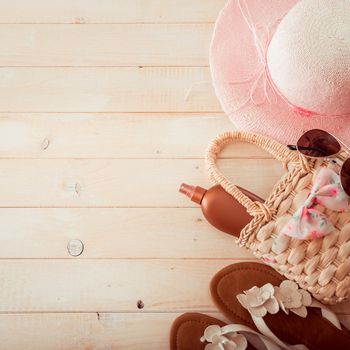 beach accessories on a white wooden background