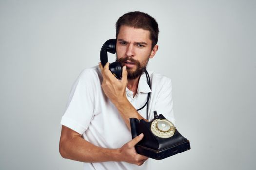 man talking on retro phone lifestyle technology. High quality photo