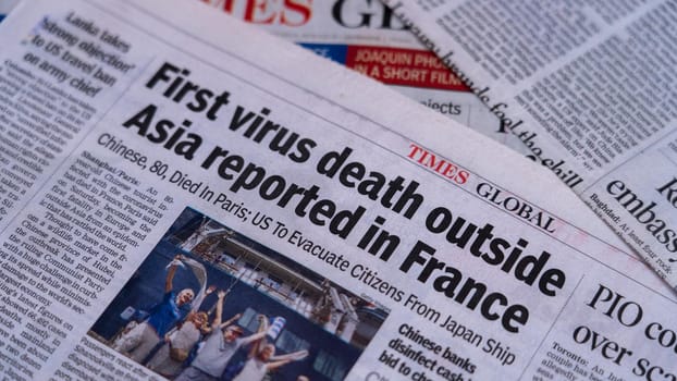 Dehradun, Uttarakhand India June 28, 2021. Coronavirus COVID-19 News Headline in Newspaper of India. Headlines of the month March, April 2020. High-quality apple prores 422 4k footage 60p.