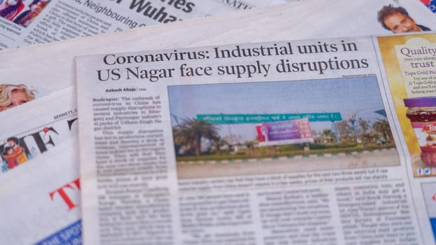 Dehradun, Uttarakhand India June 28, 2021. Coronavirus COVID-19 News Headline in Newspaper of India. Headlines of the month March, April 2020. High-quality apple prores 422 4k footage 60p.