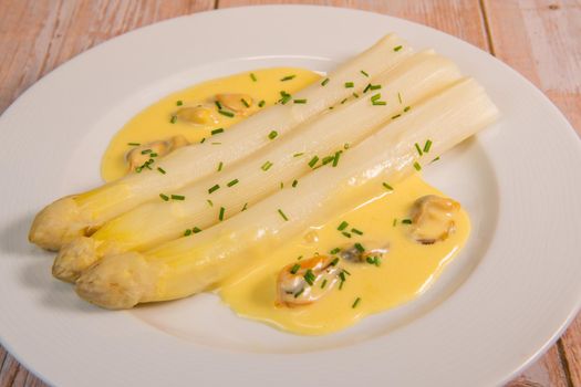 Large white asparagus and shell mousseline recipe. High quality photo