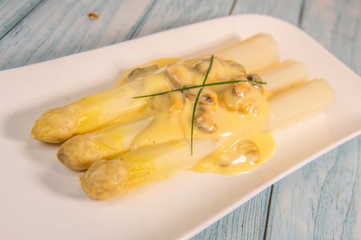 Large white asparagus and shell mousseline recipe. High quality photo