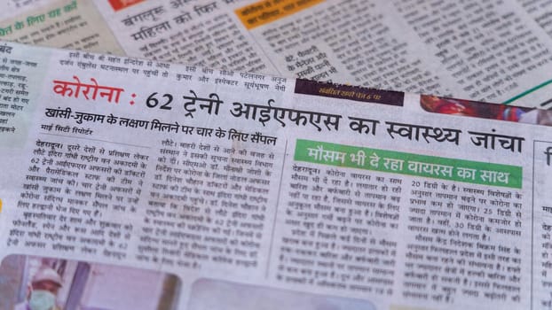 Dehradun, Uttarakhand India June 28, 2021. Hindi, Coronavirus COVID-19 News Headline in Newspaper of India. Headlines of the month March, April 2020.