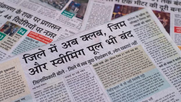 Dehradun, Uttarakhand India June 28, 2021. Hindi, Coronavirus COVID-19 News Headline in Newspaper of India. Headlines of the month March, April 2020.