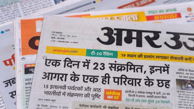 Dehradun, Uttarakhand India June 28, 2021. Hindi, Coronavirus COVID-19 News Headline in Newspaper of India. Headlines of the month March, April 2020.