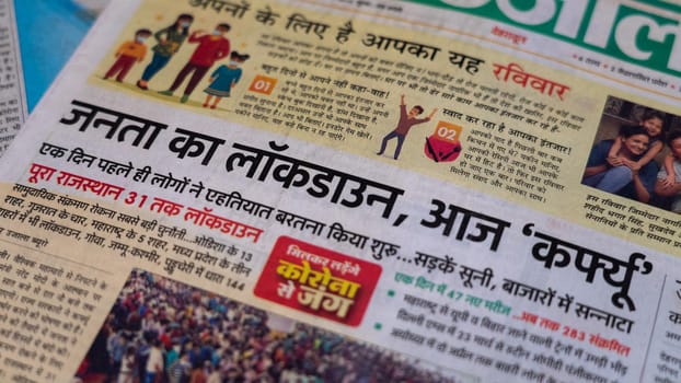 Dehradun, Uttarakhand India June 28, 2021. Hindi, Coronavirus COVID-19 News Headline in Newspaper of India. Headlines of the month March, April 2020.