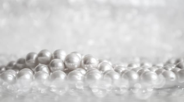 Nature white pearl beads on sparkling background