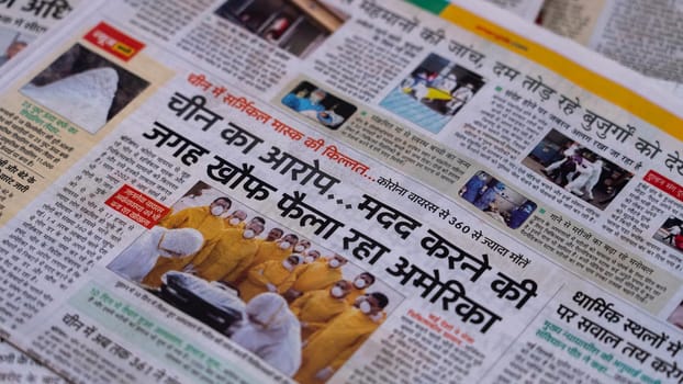 Dehradun, Uttarakhand India June 28, 2021. Hindi, Coronavirus COVID-19 News Headline in Newspaper of India. Headlines of the month March, April 2020.